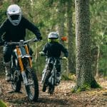 Cake Go electric children's motorcycle in the woods.