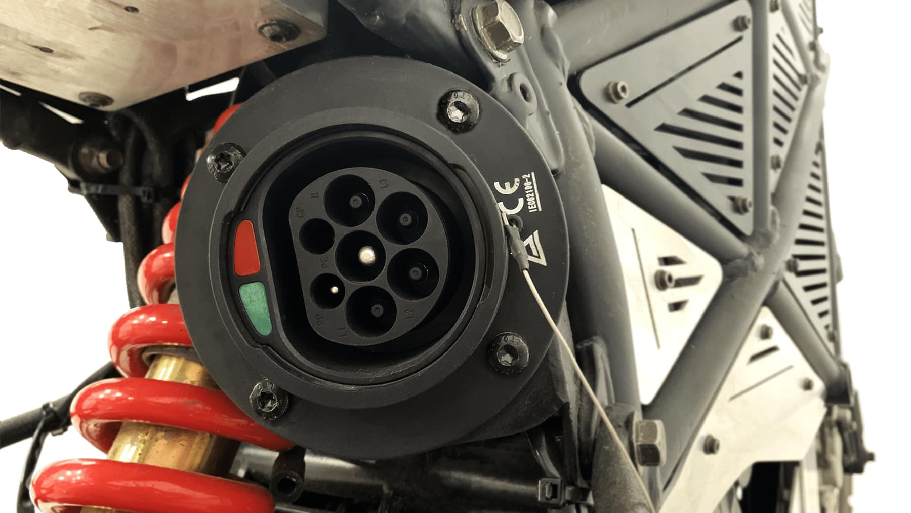 Charging port on an Emgo Scramper electric motorcycle.