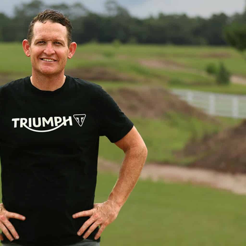 Ricky Carmichael posing for new Triumph motocross program. 