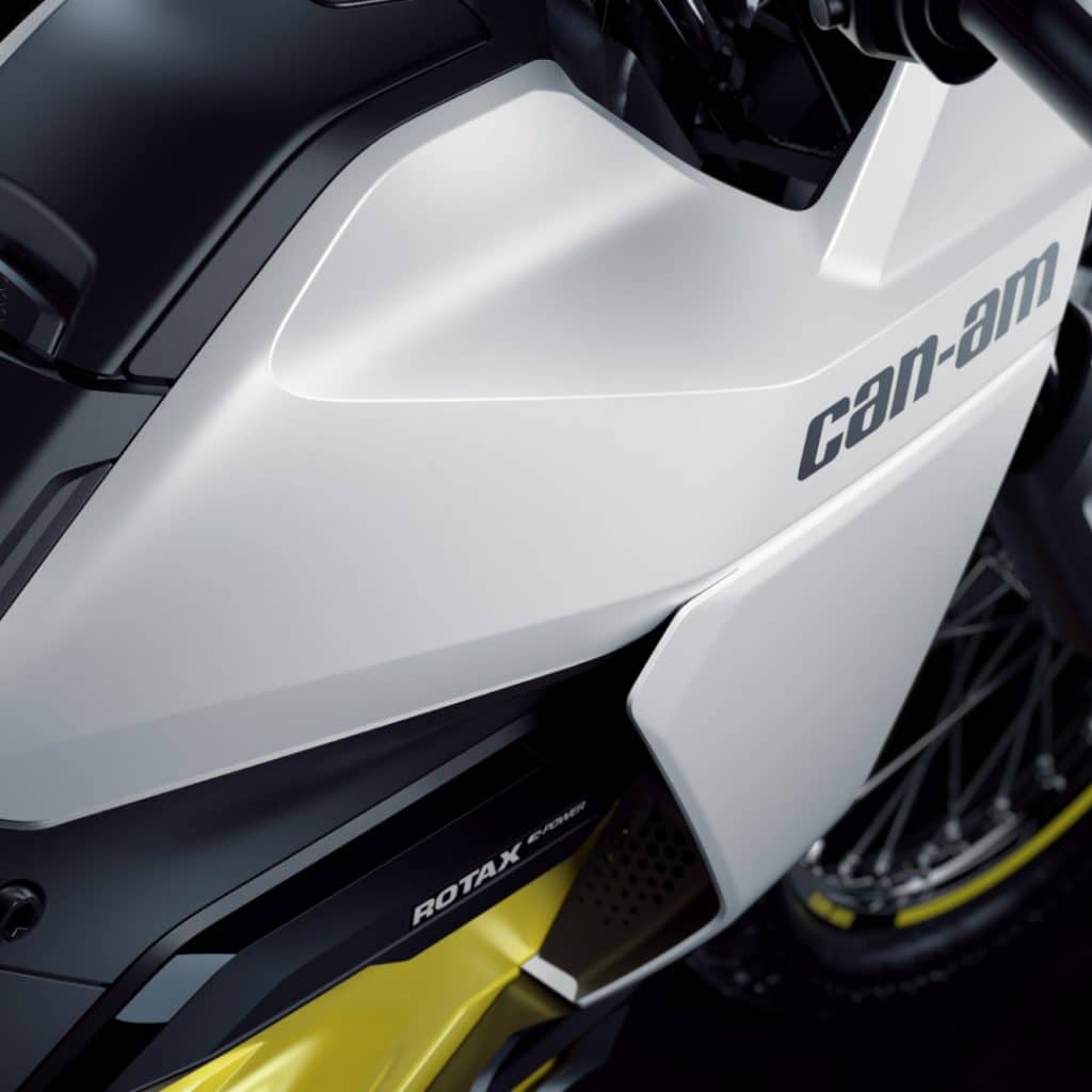 Close up detail of the tank on the Can-Am Origin electric dual sport motorcycle. 