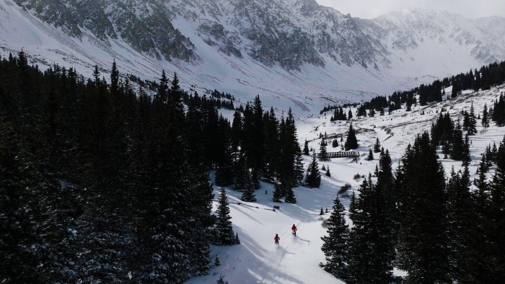 Electric snow bikes in the high alpine of the Colorado Rockies.