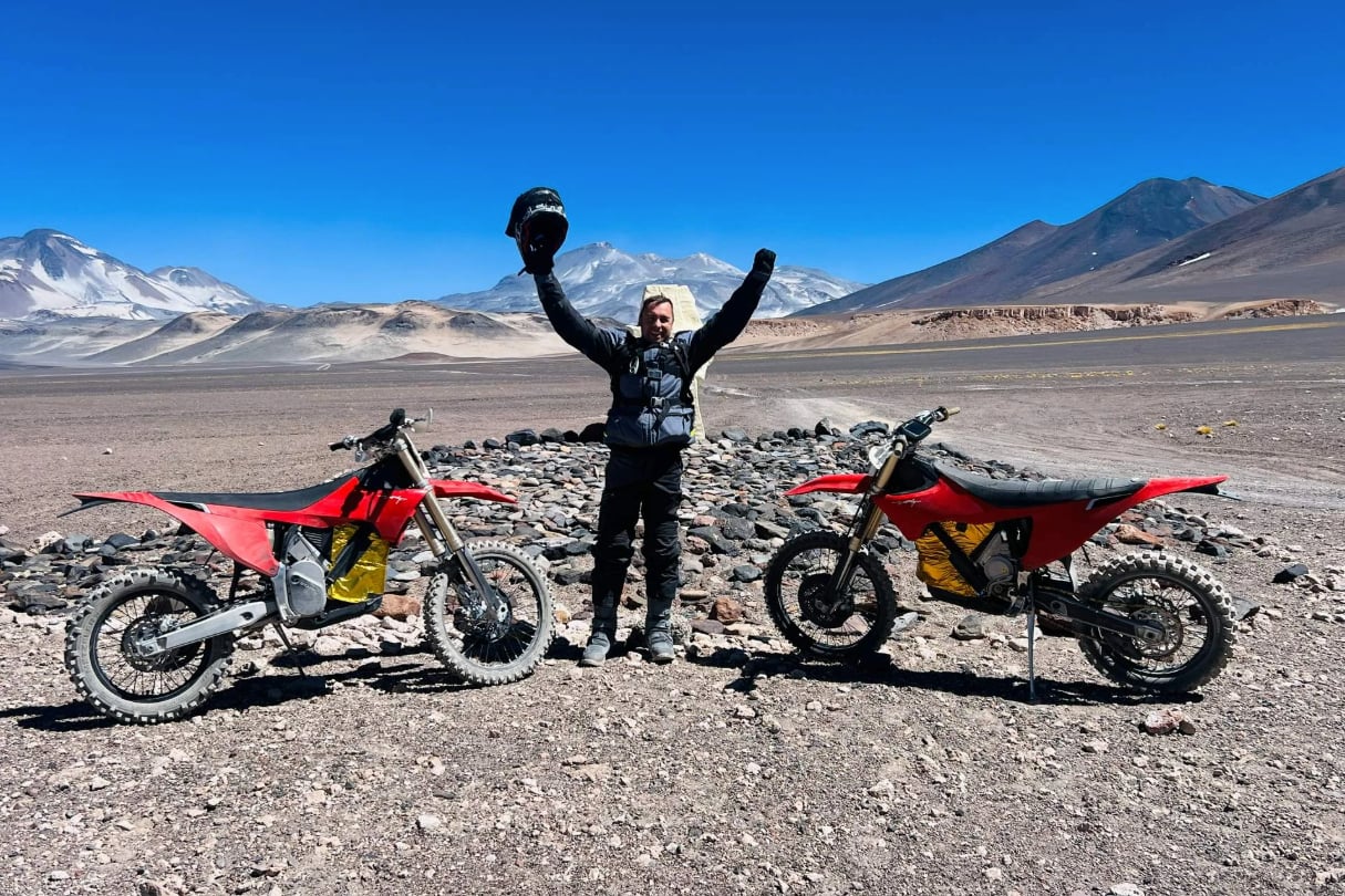 Swiss mountaineer Jiri Zak celebrates a Guinness World Record for the highest elevation reached by motorcycle. 