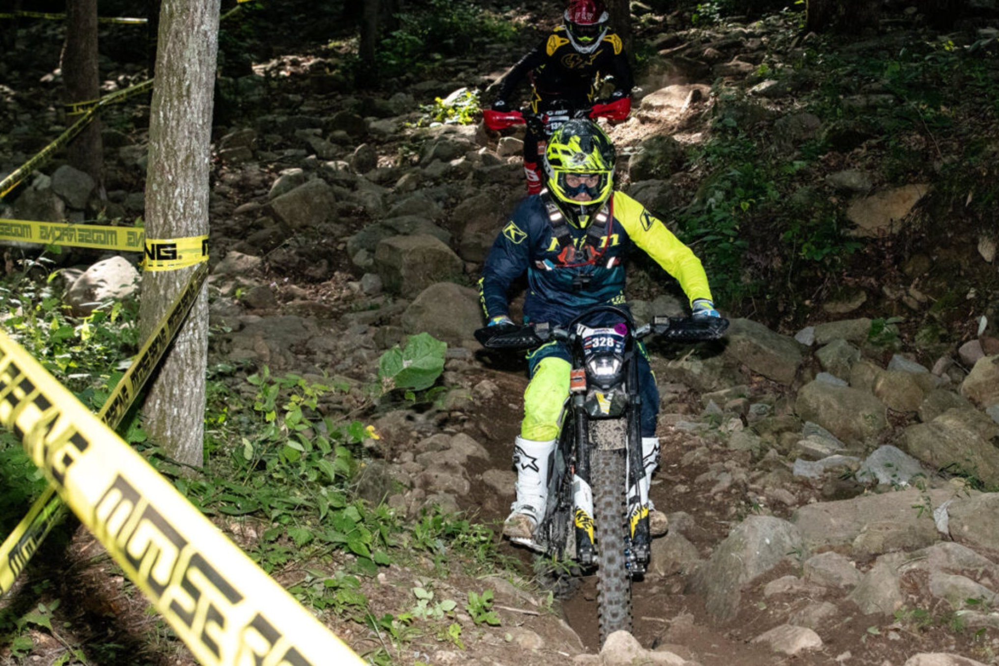 A Surron Ultra Bee tackles a rocky eMoto course in Tennessee. 