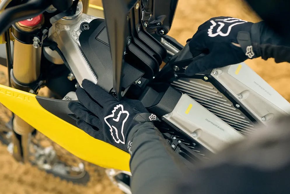Close up of Radian Infinipack batteries being quick swapped on the trail. 