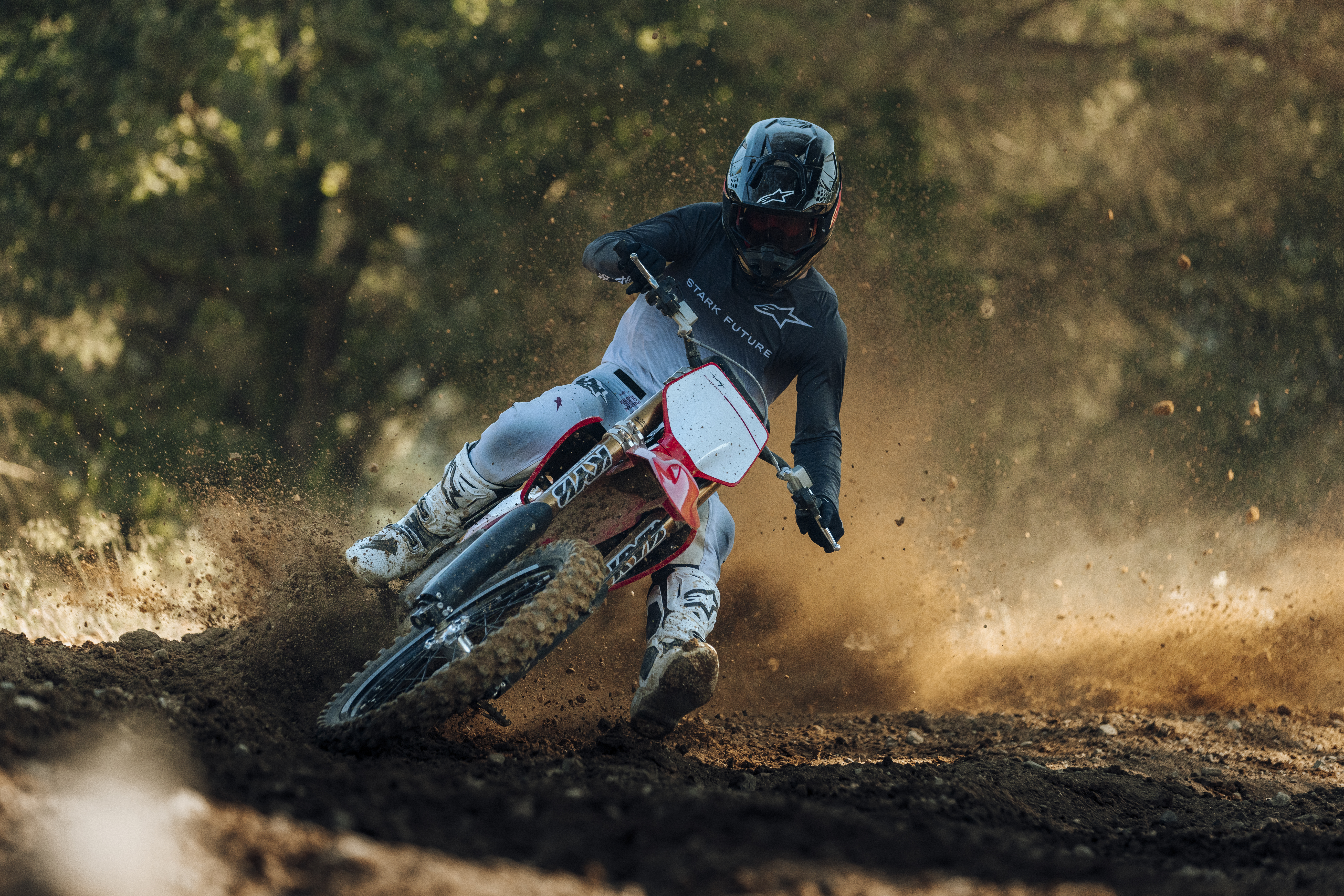 A Stark Varg MX Factory Edition sliding around a turn. 